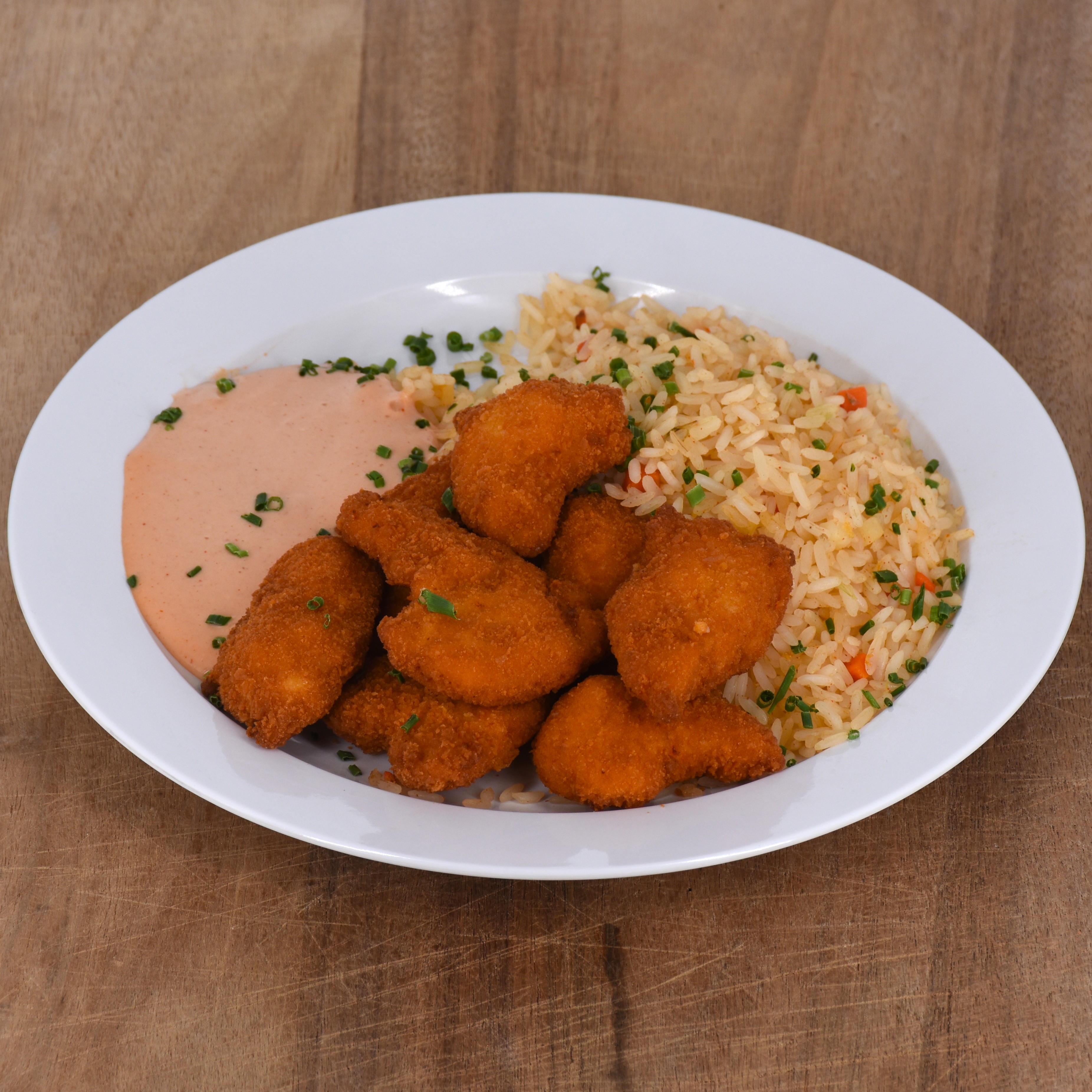 Foto: Mahlzeit "Welcome" Chicken Crossies mit Cocktaildip und Langkornreis